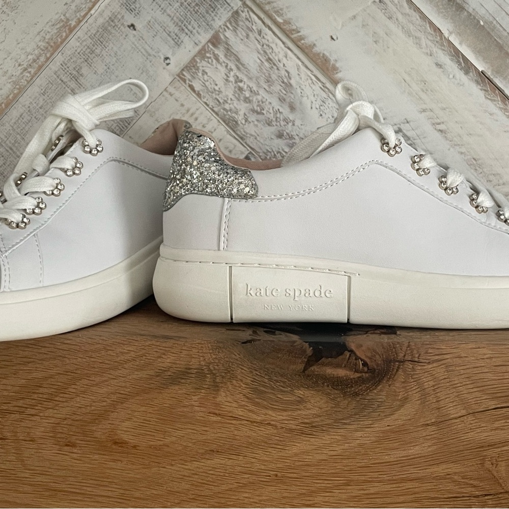 Adorable Kate Spade sneakers with rhinestones and glitter accents.